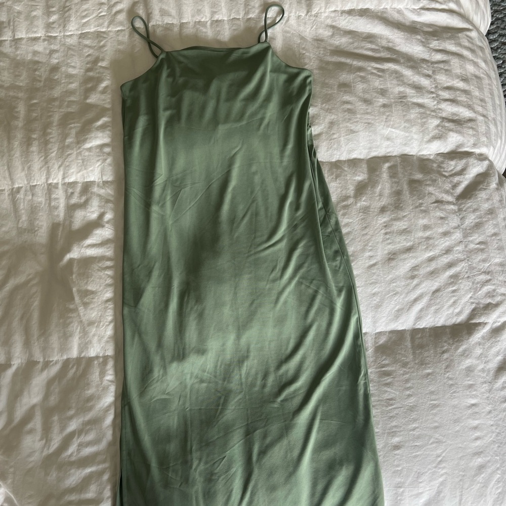 Green MIDI dress with right slit.